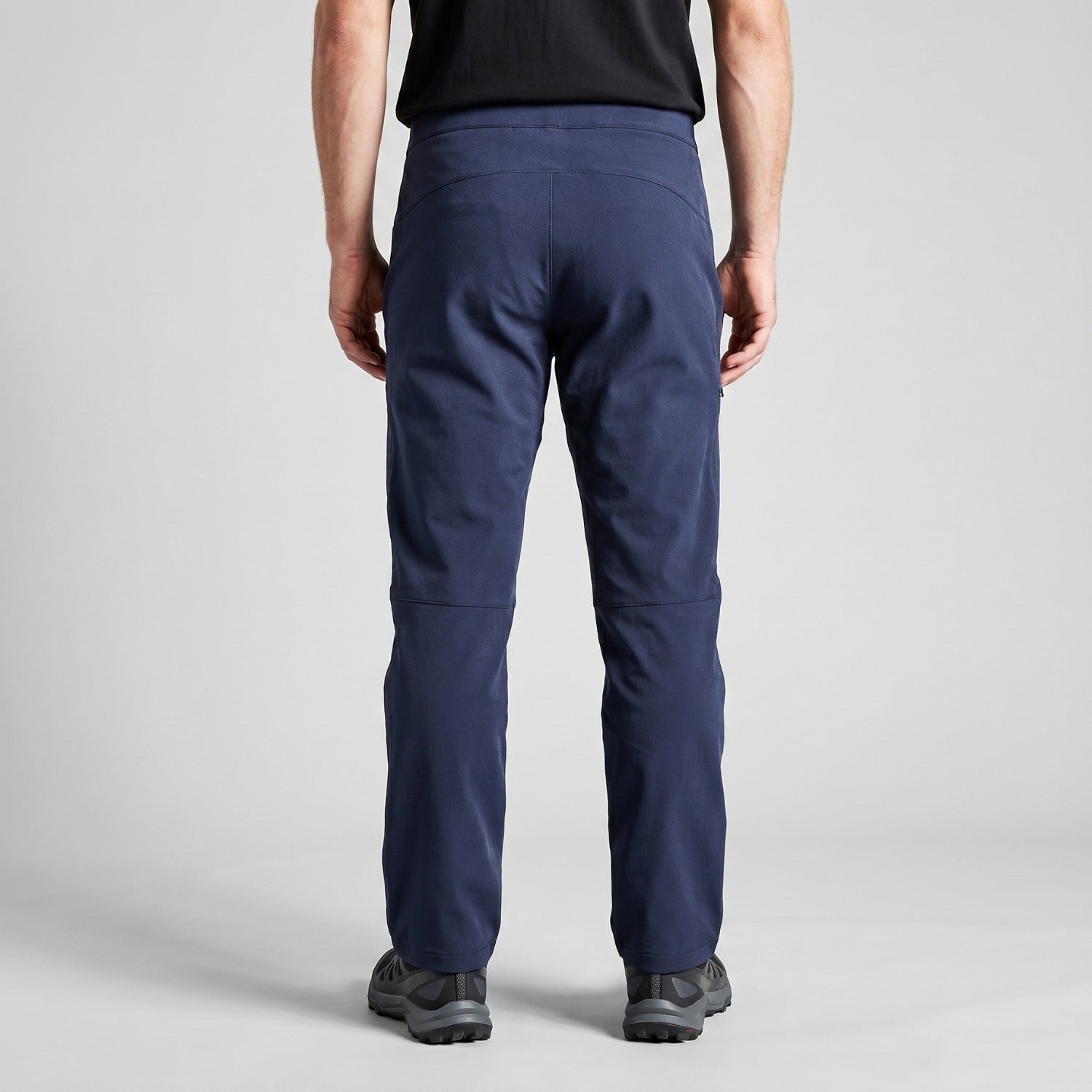 Men's navy walking trousers worn, back view