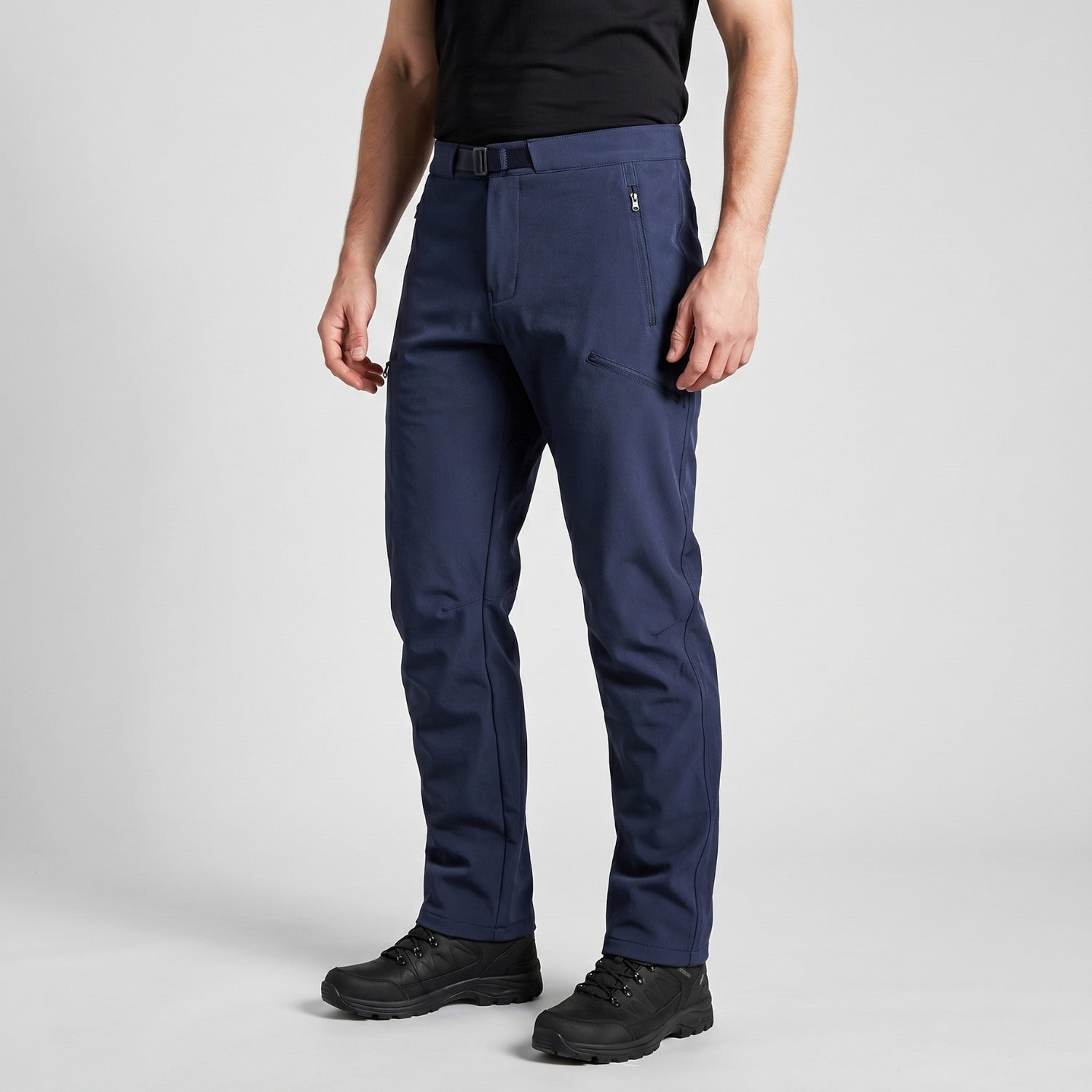 Men's navy walking trousers worn, three-quarter view