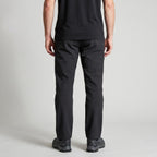 Men's black walking trousers worn, back view