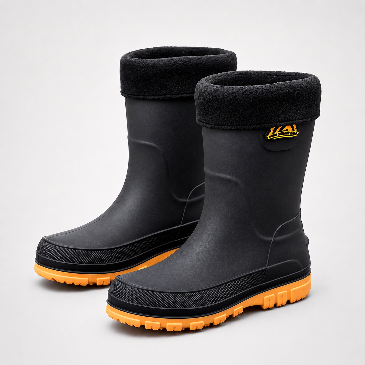 Men's fleece lined wellies in Black / Yellow, a pair on a light grey background