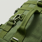 Close-up of the MOLLE webbing and clip on the fishing backpack