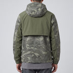Camo anorak worn from behind showing the storm-cape back yoke