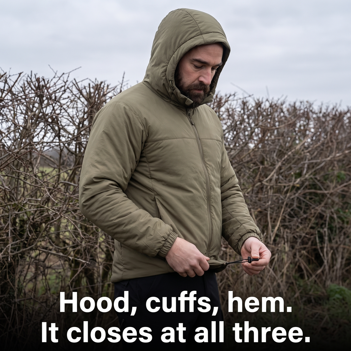Hood, cuffs and hem all drawn in on the padded jacket