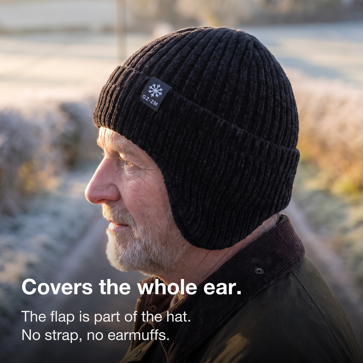 Man wearing the black knitted winter hat with the ear flap covering his whole ear