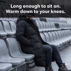 Man sitting on a stadium bench, the long puffer coat covering his thighs