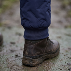 Elasticated ribbed ankle hem over hiking boot