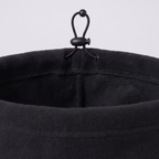 Close-up of the snood's single-layer polar fleece and cord lock