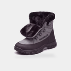 Snow boot with the collar folded down showing dense black plush lining inside