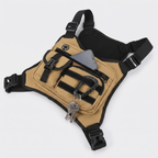 The chest bag with its pockets open and keys on the snap hook