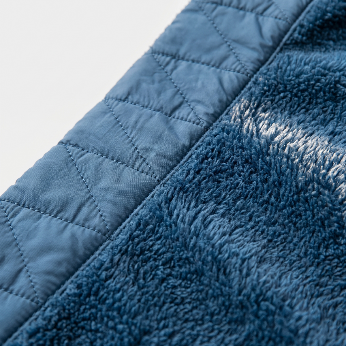 Close-up of the quilted panel bonded to the fleece inside the body