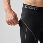 Close-up of the stretch mesh fabric pulled at the hip below the SPORT waistband