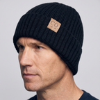 Fold-up cuff of the woolly hat covering the ears