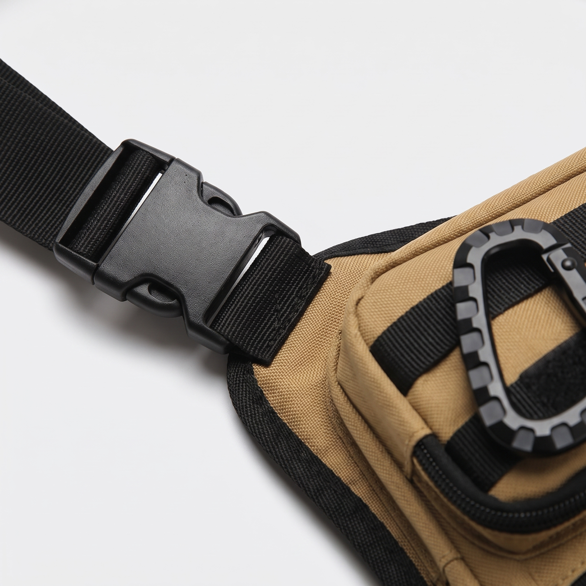 Close-up of the side-release buckle, webbing and metal snap hook