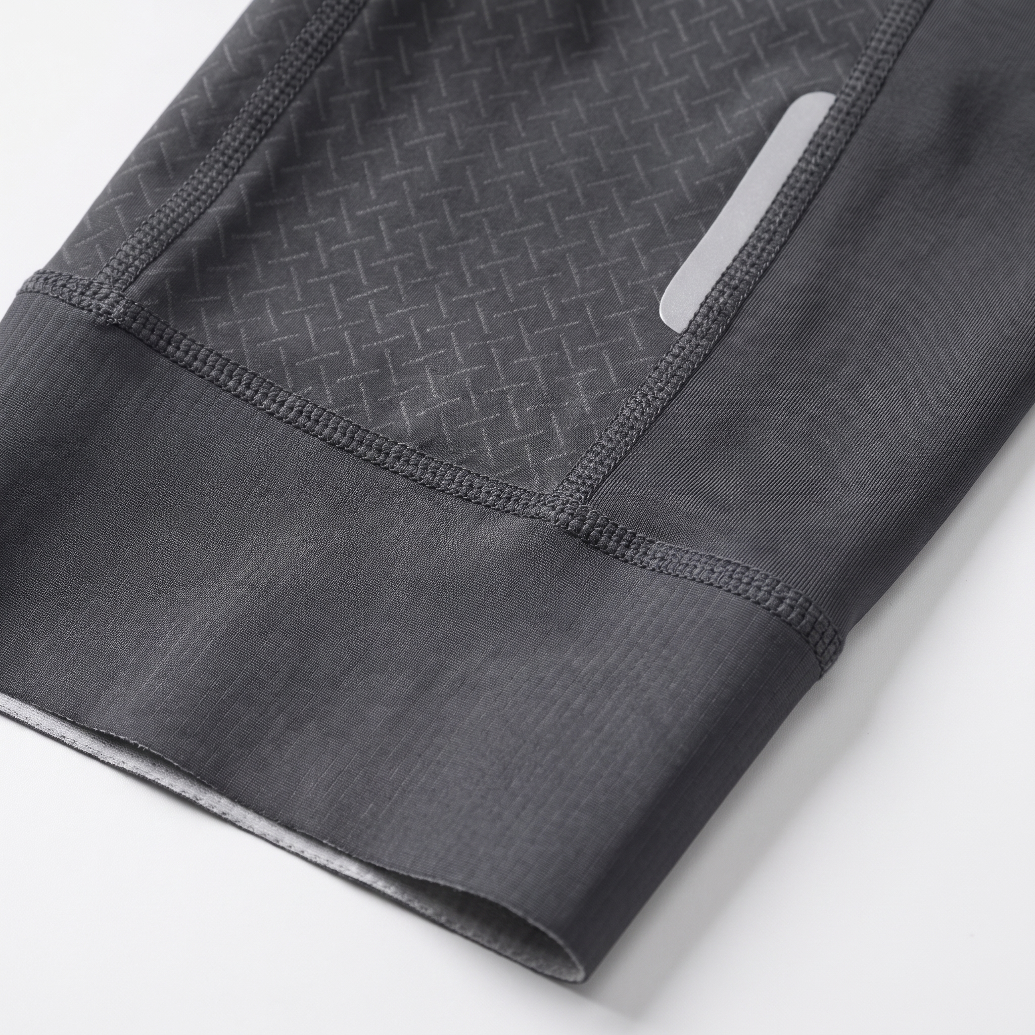 Close-up of the wide silicone leg gripper and reflective strip