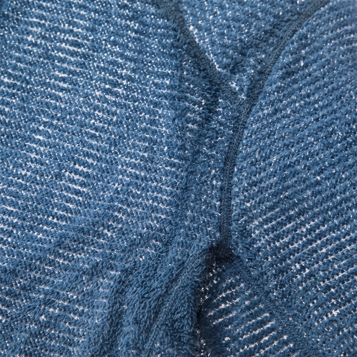 Close-up of the flecked high-loft knit face