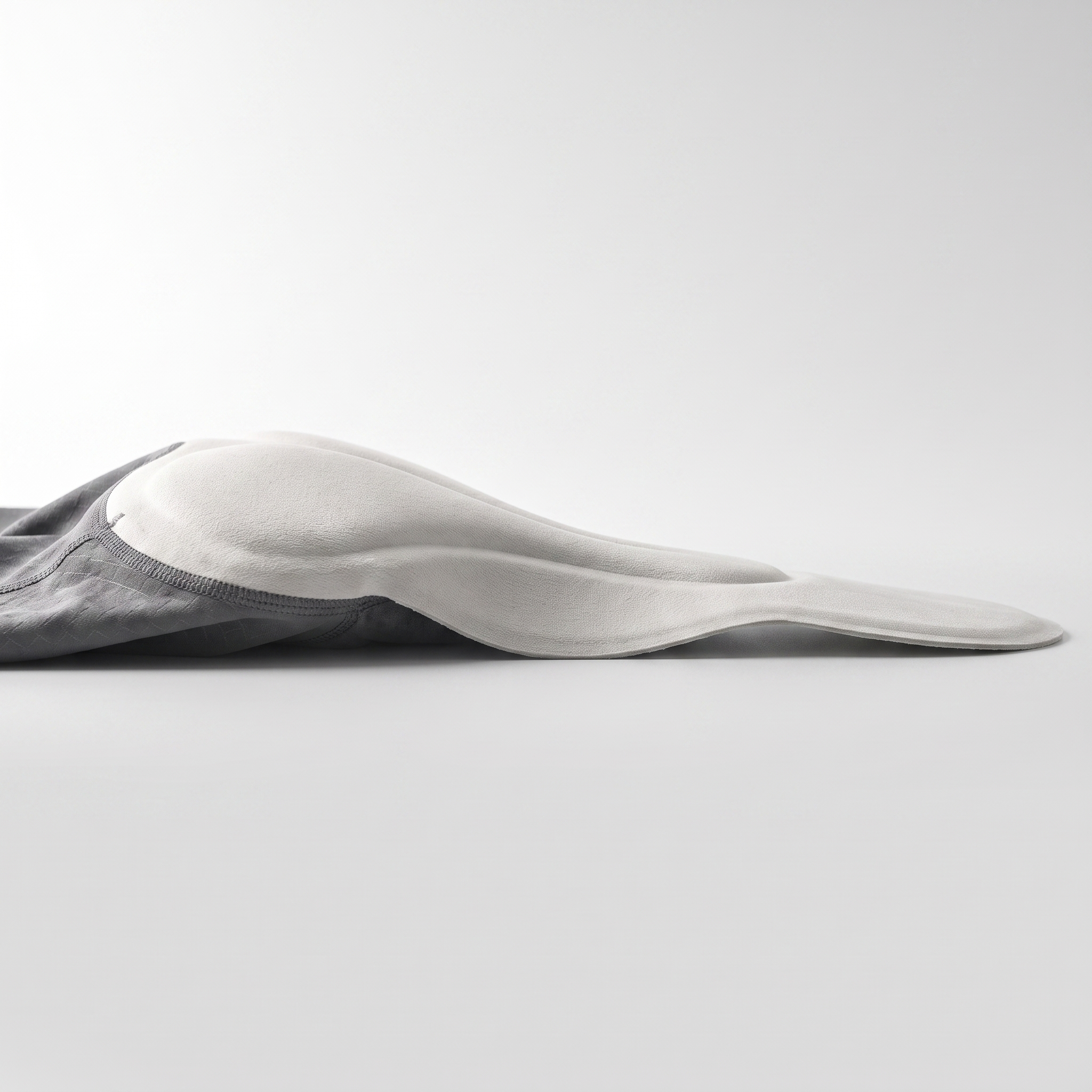 Side profile of the pad showing the taper to a thin edge
