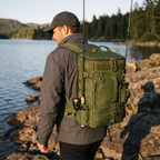 Angler on a rocky bank wearing the fishing backpack with a rod carried on his back