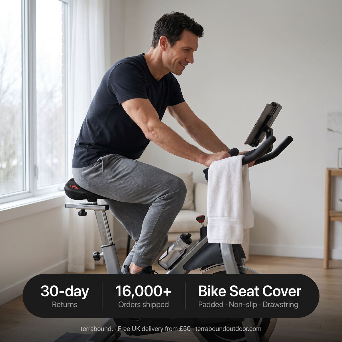 Man on an exercise bike at home with the padded seat cover, with key facts: 30-day returns, 16,000+ orders