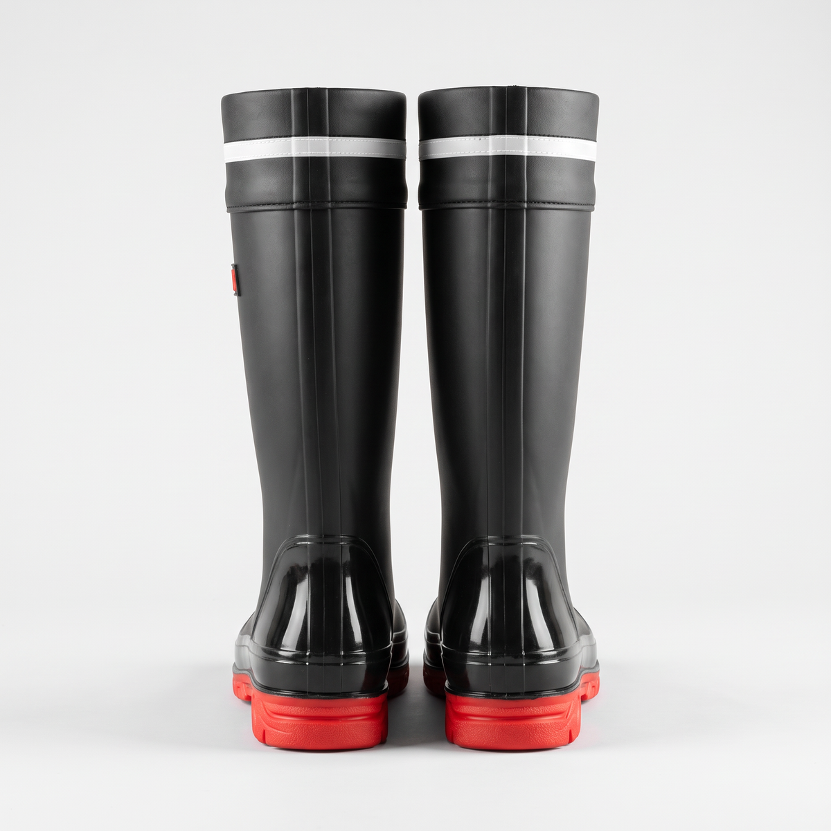Back view of the black and red mid-calf wellies showing the heel and reflective band