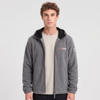 Men's grey windproof fleece jacket worn open, showing the black hood lining