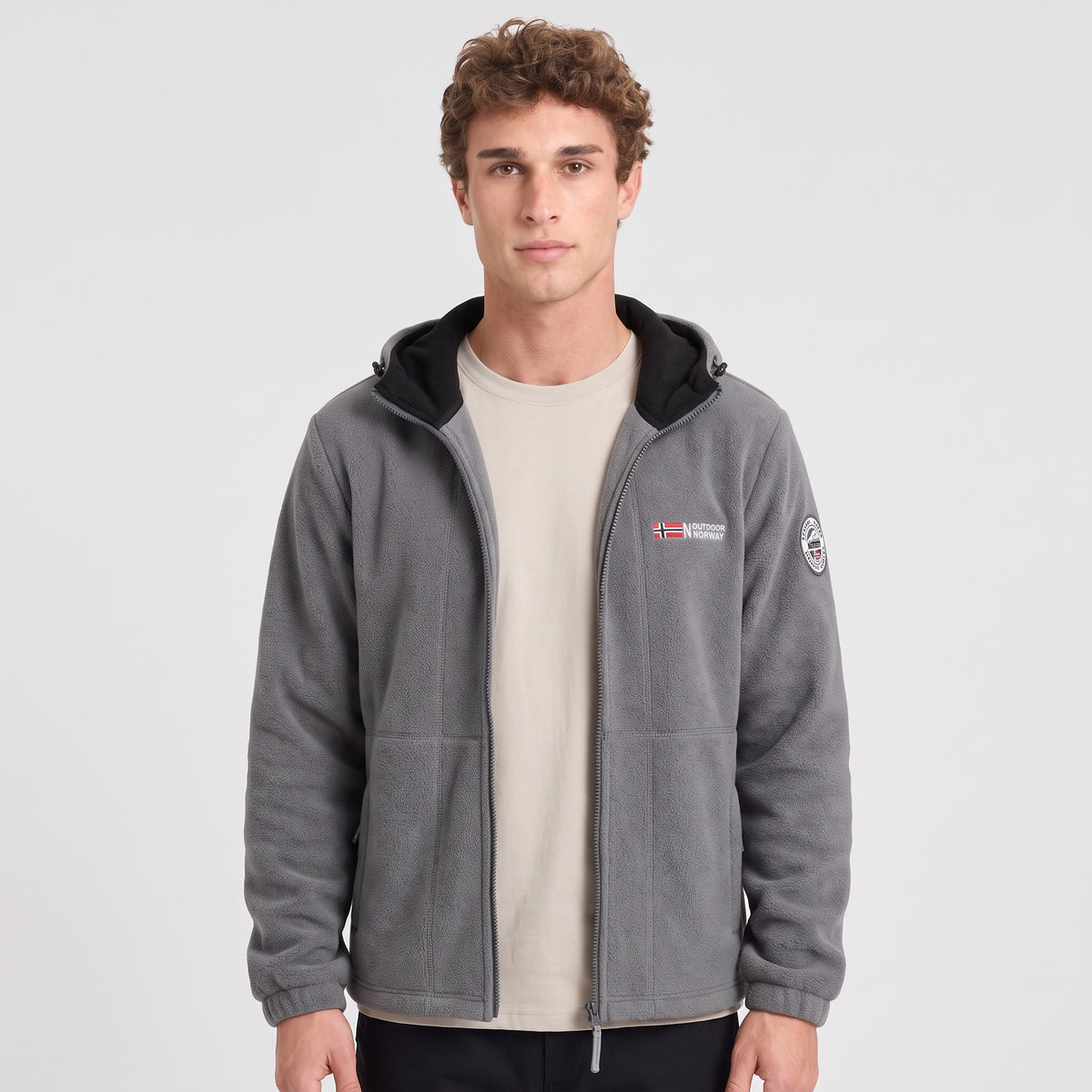 Men's grey windproof fleece jacket worn open, showing the black hood lining