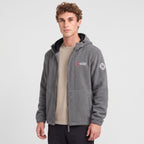 Men's grey windproof fleece jacket worn, three-quarter view