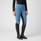 Women's two-tone jodhpurs in sky blue with a dark inner-leg panel, front view