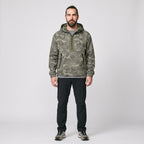 Man wearing the Terrabound camo half-zip anorak, full length
