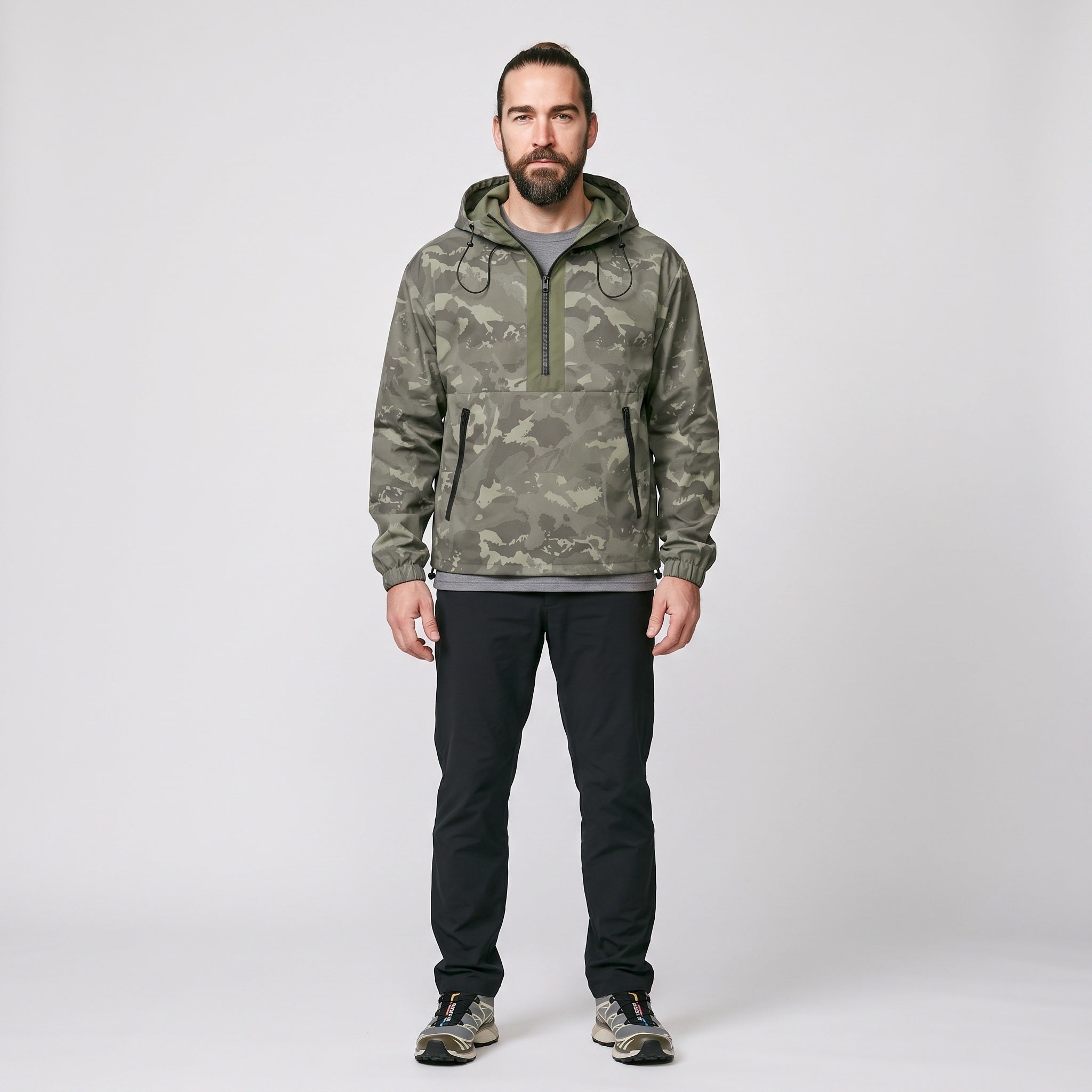 Man wearing the Terrabound camo half-zip anorak, full length
