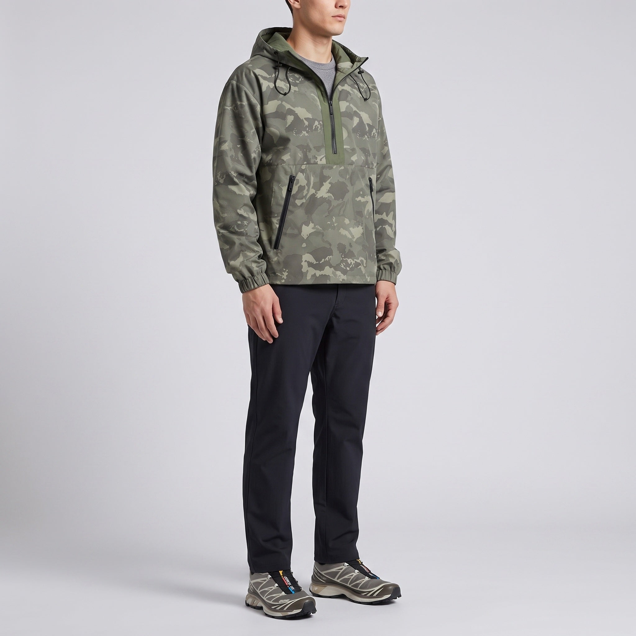 Camo half-zip anorak worn, three-quarter side view