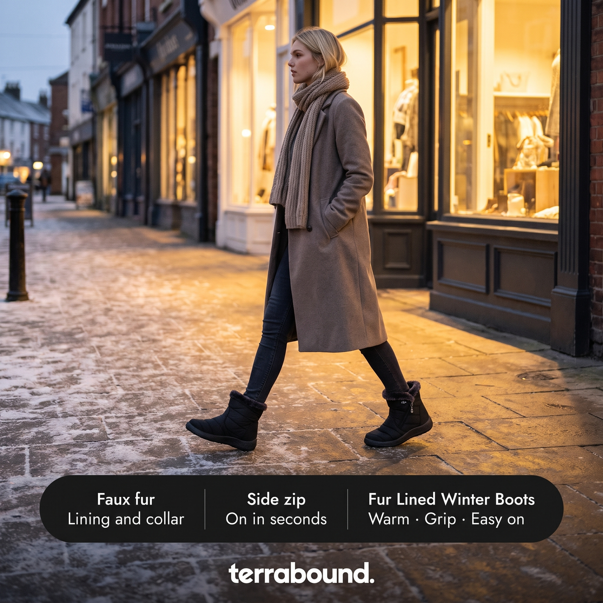 Woman walking down a frosty high street at dusk in black winter boots