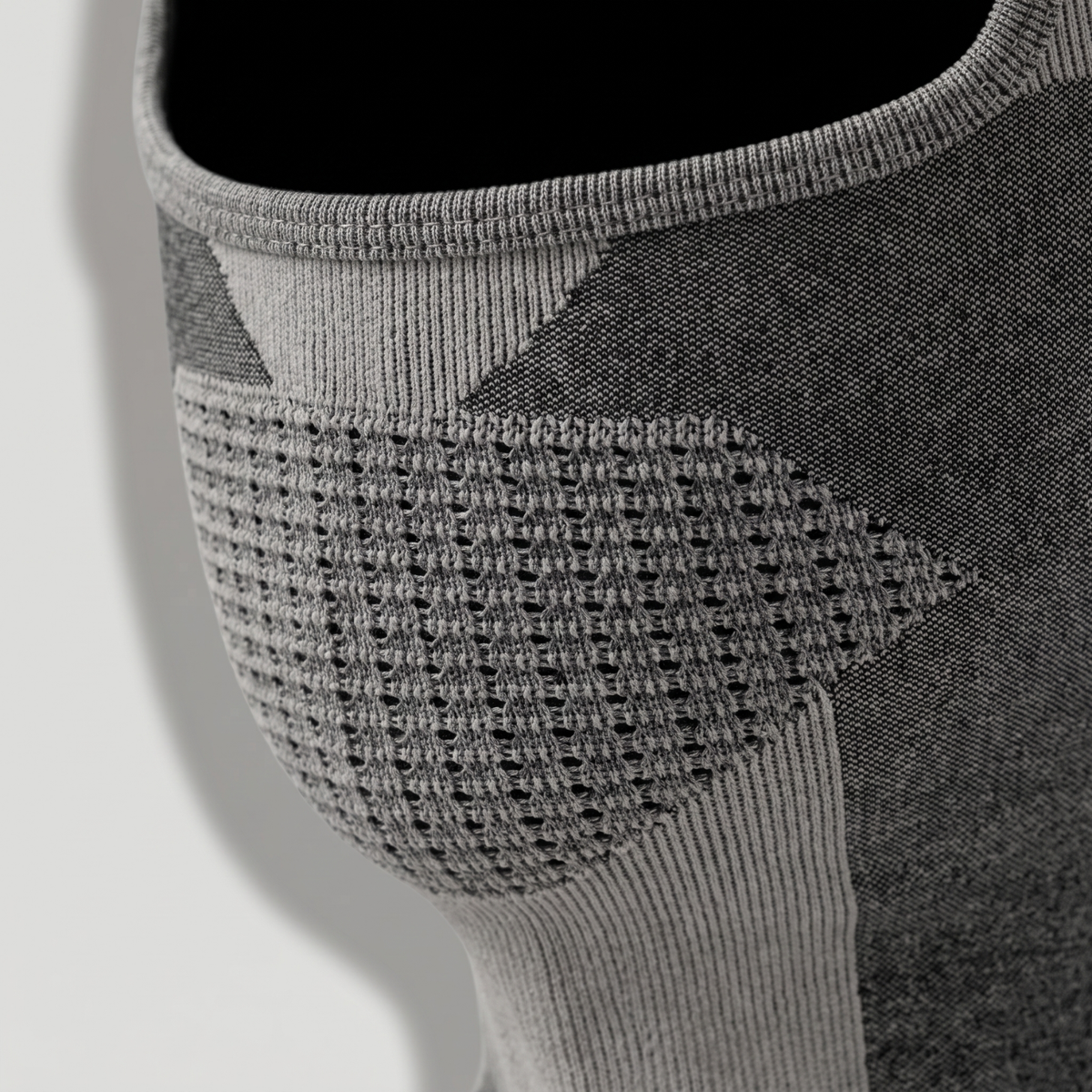 Close-up of the perforated open-mesh panel knitted over the mouth and chin of the thermal balaclava