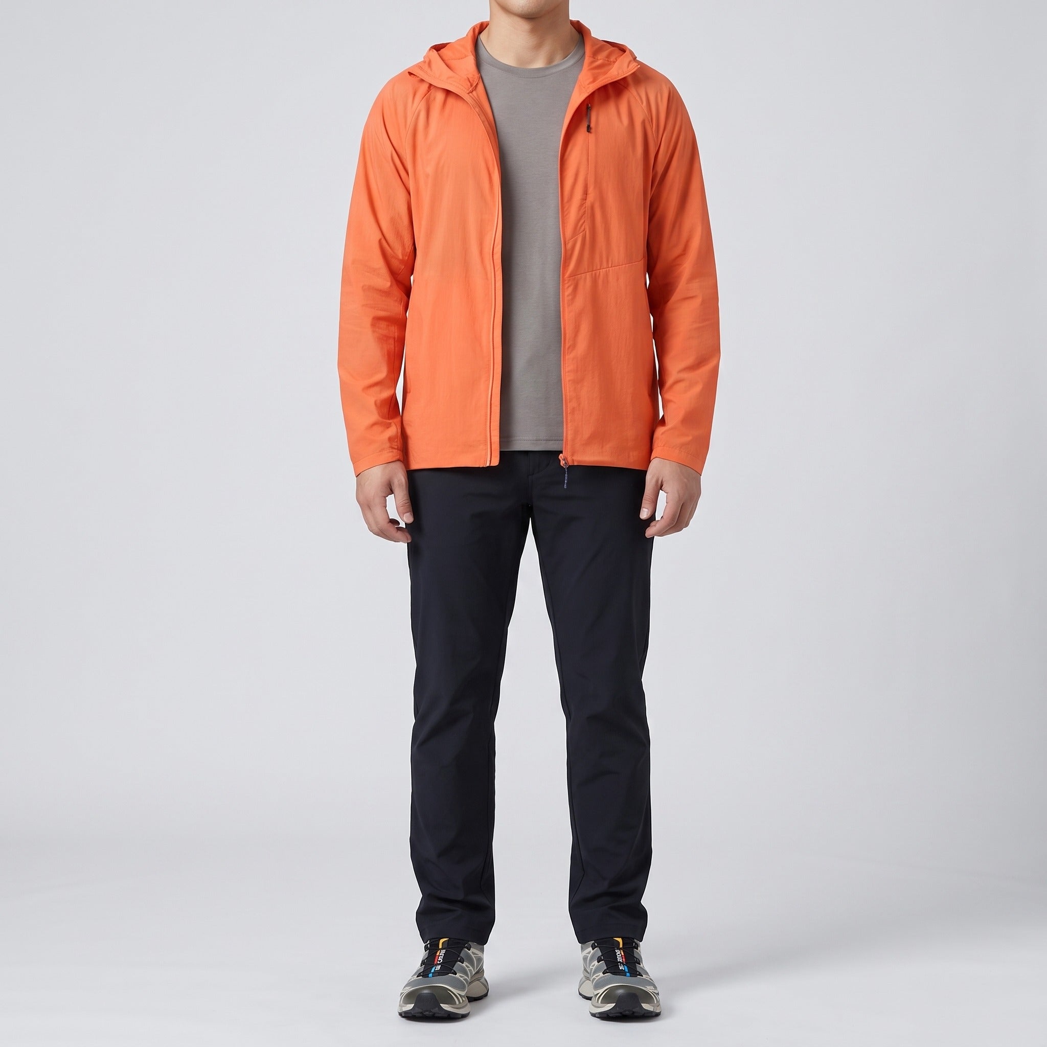 Men's windbreaker in Sunset Orange worn, front