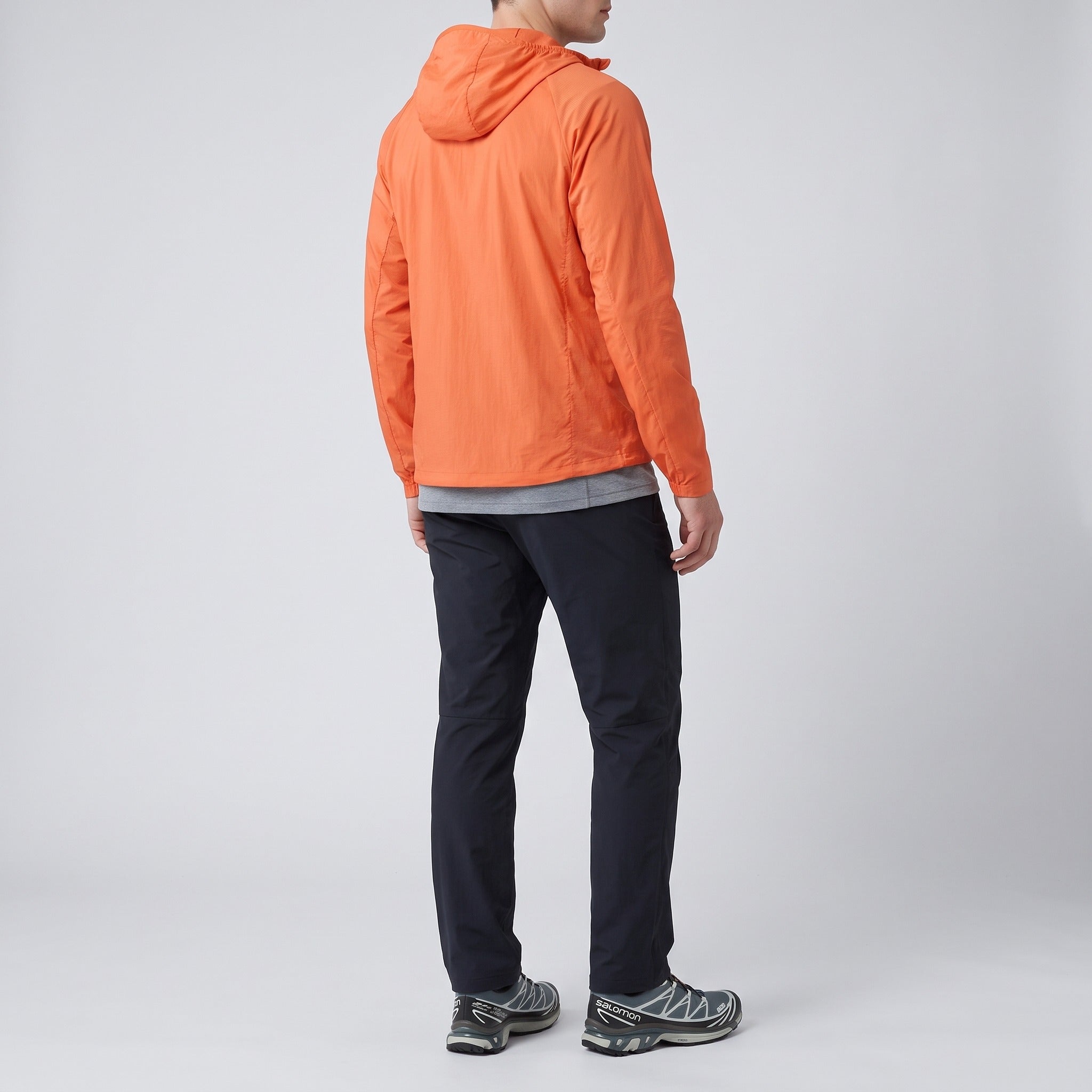Men's windbreaker in Sunset Orange, side view