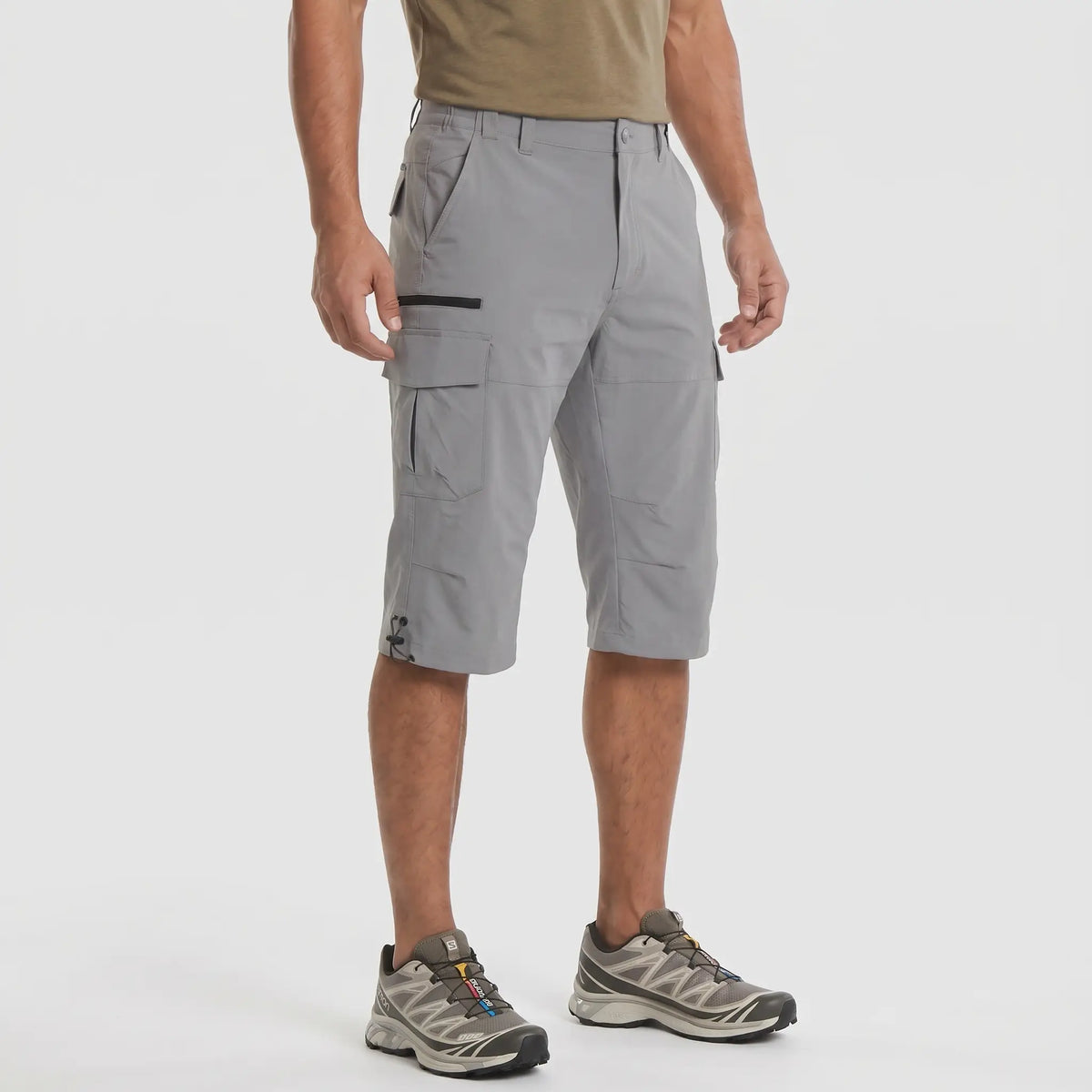 Grey 3/4 cargo shorts worn, three-quarter side view