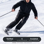 Skier in action wearing terrabound. ski trousers under a fully zipped ski jacket