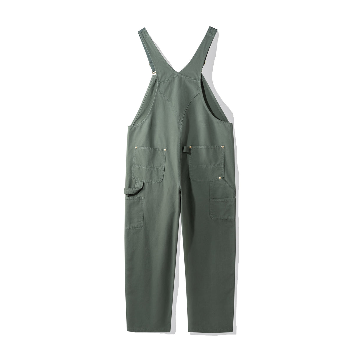 Green canvas bib dungarees showing the crossback straps