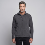Man wearing the charcoal men's fleece vest over a long-sleeved top, front