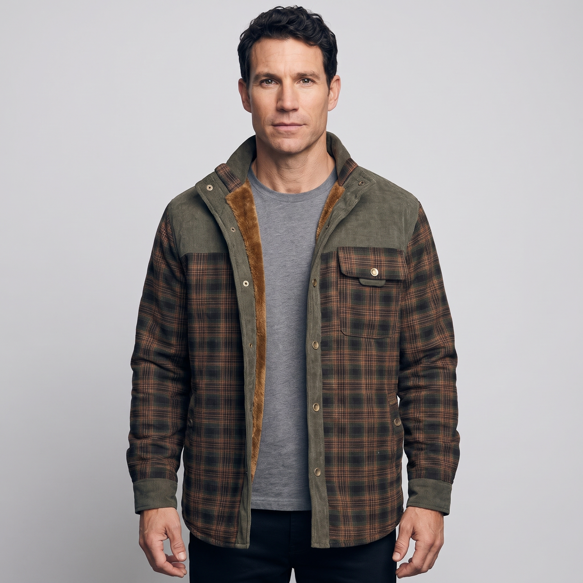 Man wearing the men's fleece lined check overshirt in Army Green open over a grey T-shirt