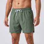 Men's swim shorts in Forest Green - front