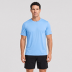 Man wearing the men's running top in Sky Blue, studio front view