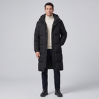 Full length view of the black long puffer coat falling below the knee
