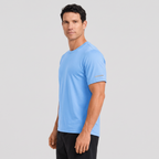 Man wearing the men's running top in Sky Blue, three-quarter side view with the reflective sleeve strip