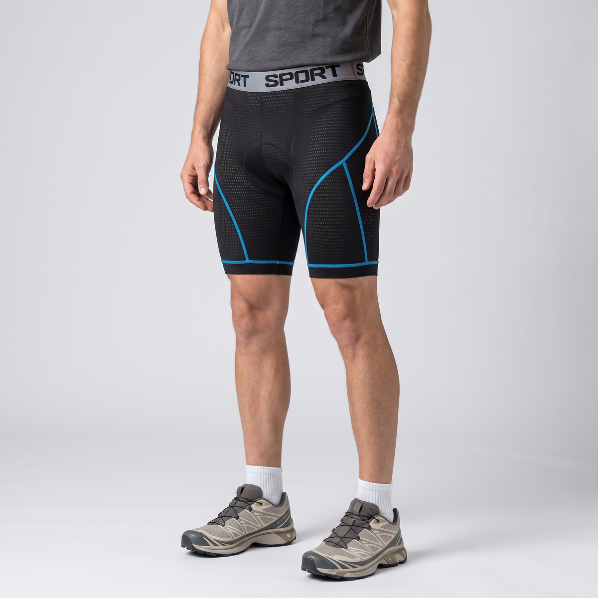 Three-quarter side view of the blue padded cycling liner shorts worn