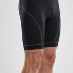 Close-up of the mid-thigh leg hem and flat grey seams of the padded cycling liner