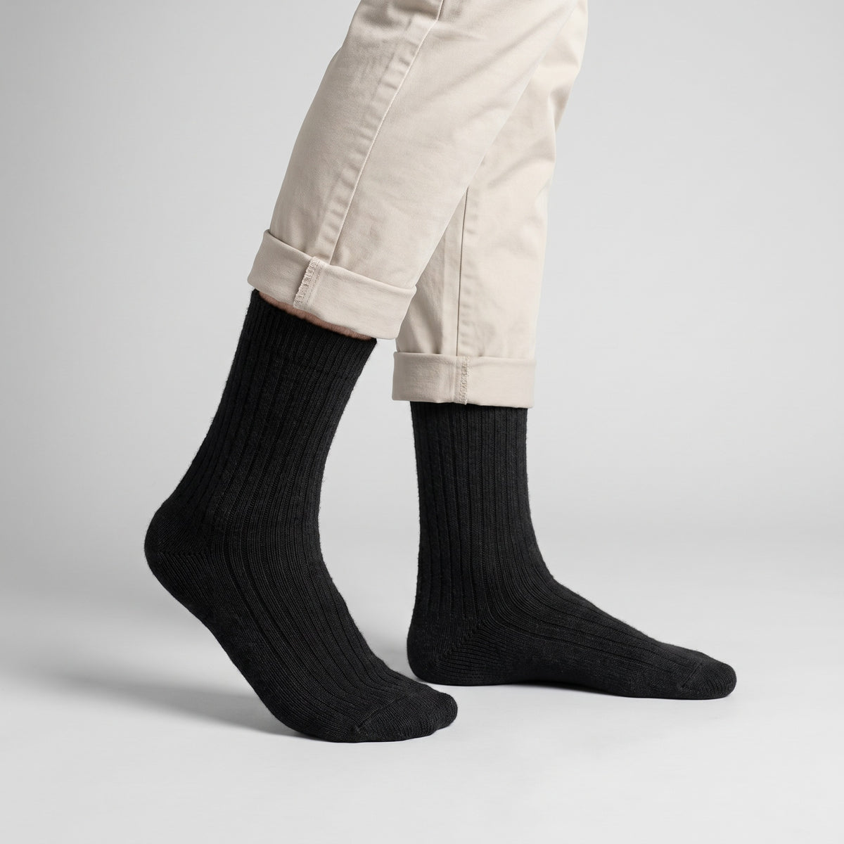 Black wool socks worn by a man