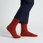 Red wool socks worn by a woman