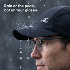 Rain dripping off the peak of the running cap while the wearer's glasses stay clear