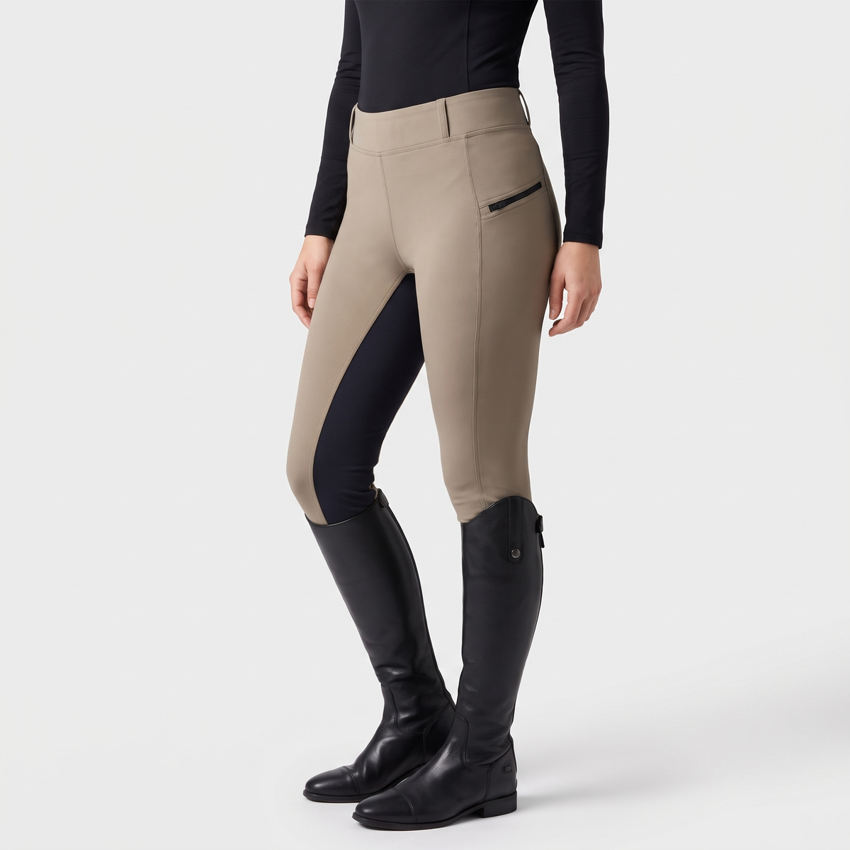 Taupe two-tone jodhpurs from the side with the zip pocket and dark inner-leg panel