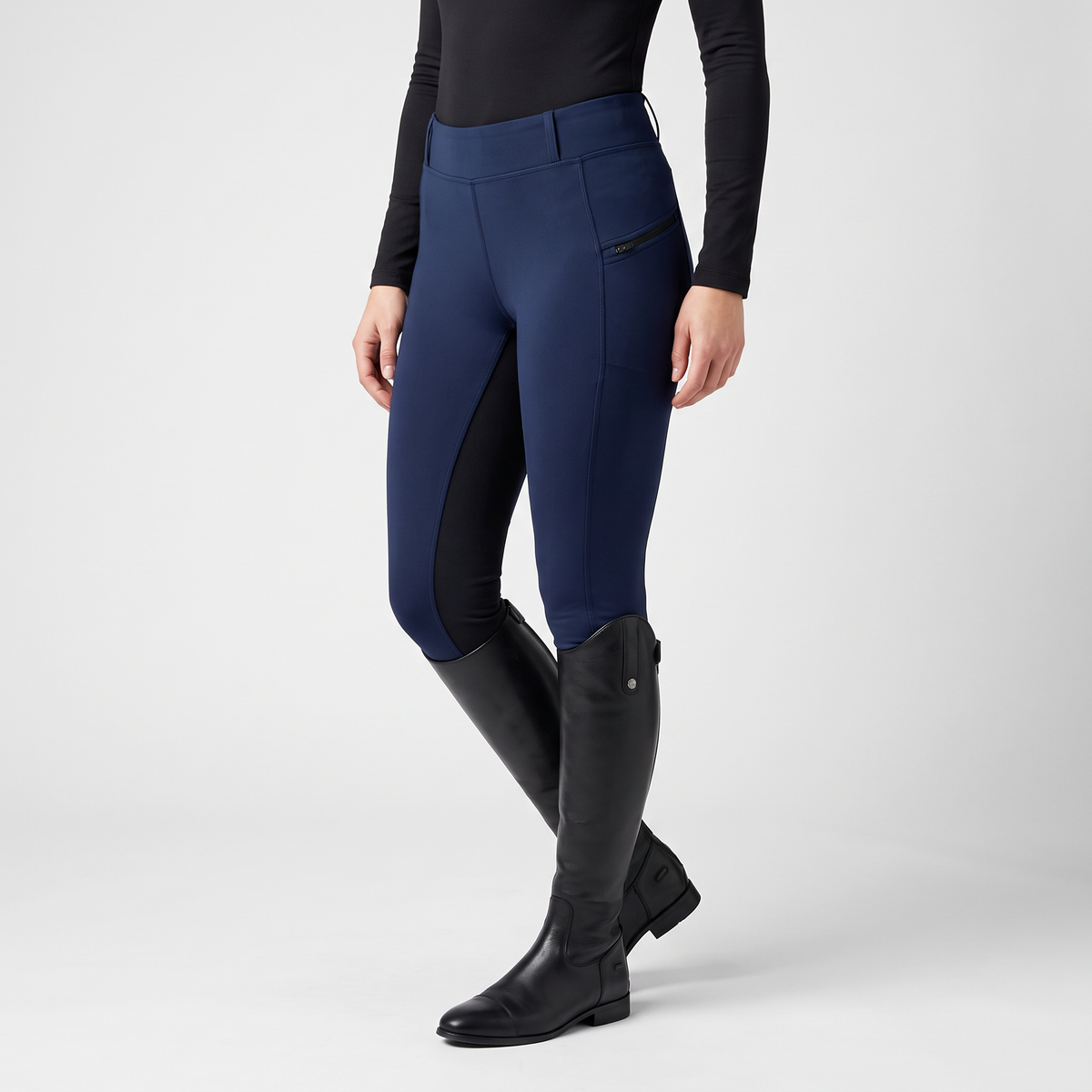 Navy two-tone jodhpurs from the side, showing the zip pocket and the dark inner-leg panel